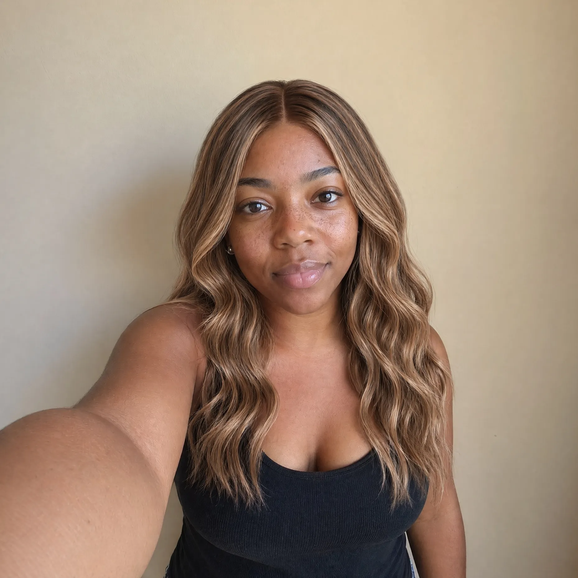 Customer selfie with the brown hairstyle applied.